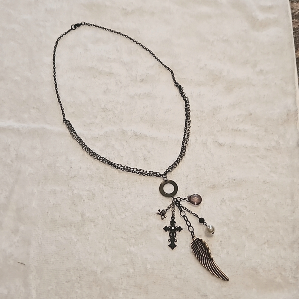Rock/Goth necklace; wear as is or use the 5 charms separately! 12-inch chain